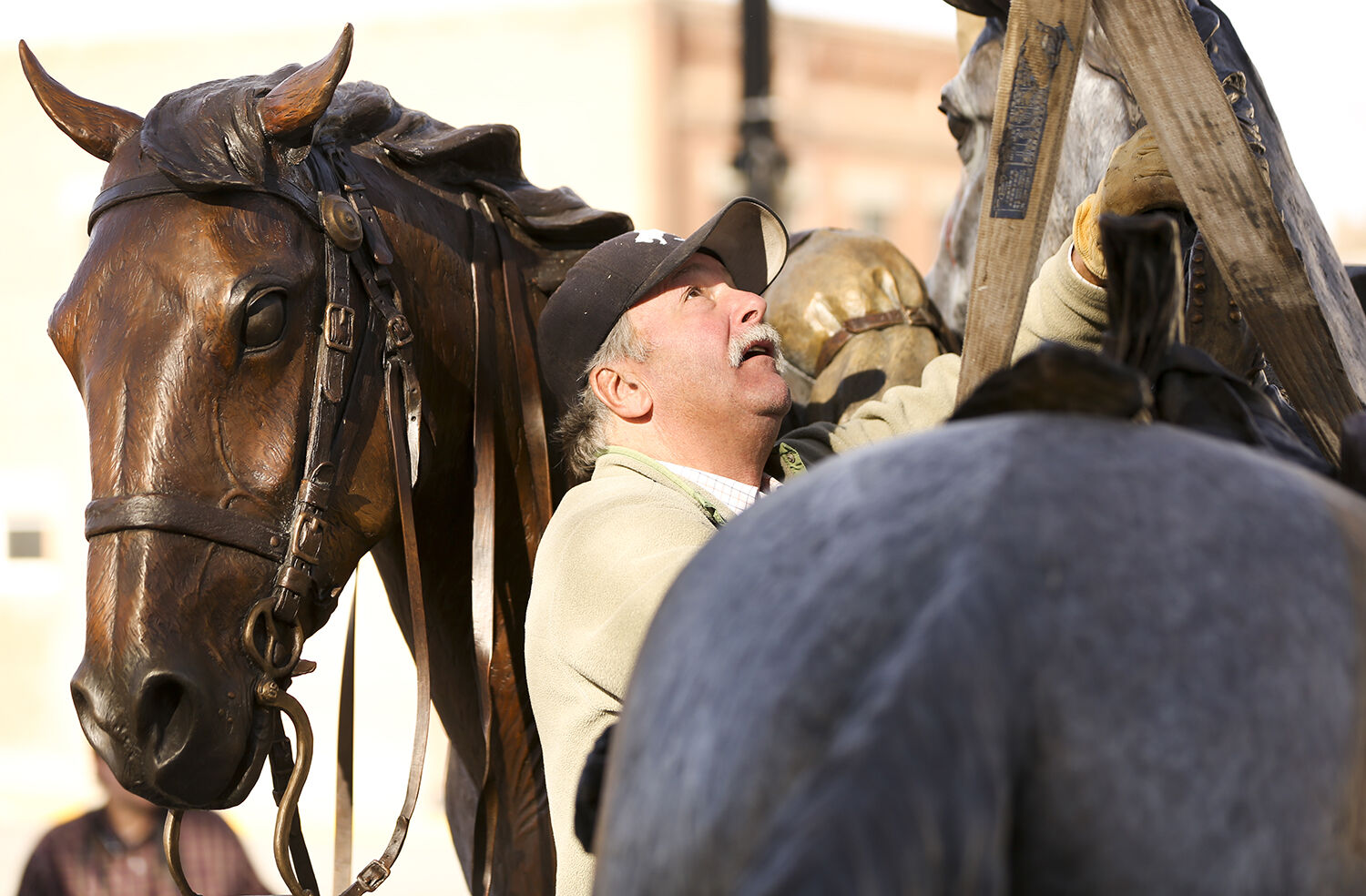 Artist Mike Thomas waits for the fork to be lowered